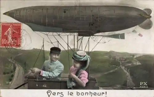 Ak Mann und Frau in einem Luftschiff, Fotomontage