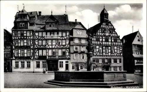 Ak Butzbach im Taunus Hessen, Marktplatz, Fachwerkhäuser