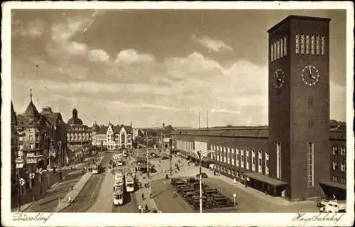 Ak Düsseldorf am Rhein, Hauptbahnhof, Turm, Turmuhr, Straßenbahnen