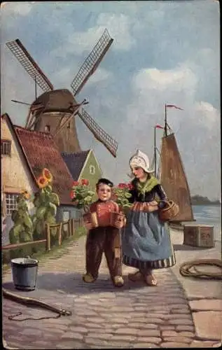 Ak Trachten Niederlande, Windmühle am Wasser, Sonnenblumen