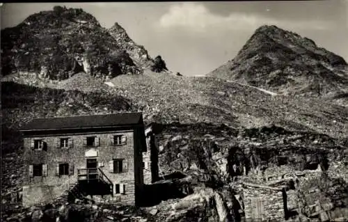 Ak St. Pöltner Hütte am Felbertauern mit Tauernkogel, Berghütte