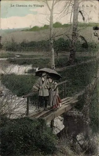 Ak Frankreich, Liebespaar, Frau in Volkstracht, Brücke, Regenschirm