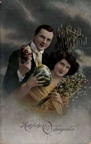Ak Glückwunsch Ostern, Mann und Frau mit Ostereiern und Weidenkätzchen