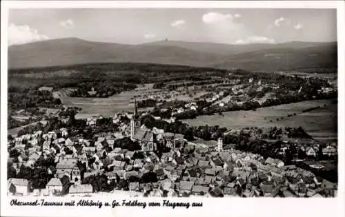 Ak Oberursel im Taunus Hessen. Luftbild, Gesamtansicht, Großer Feldberg, Altkönig, Kirche