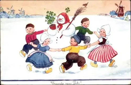 Künstler Ak Wills, John, Fröhliches Neujahr, Kinder in niederländischer Tracht tanzen um Schneemann