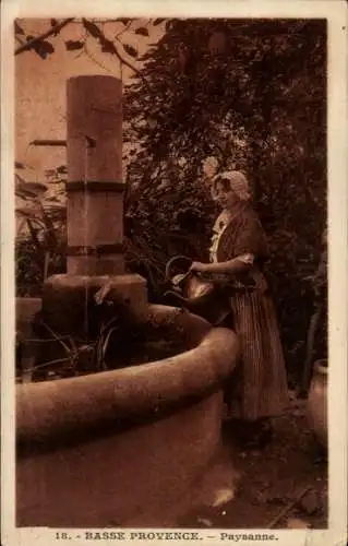 Ak Provence, Frau in Tracht am Brunnen