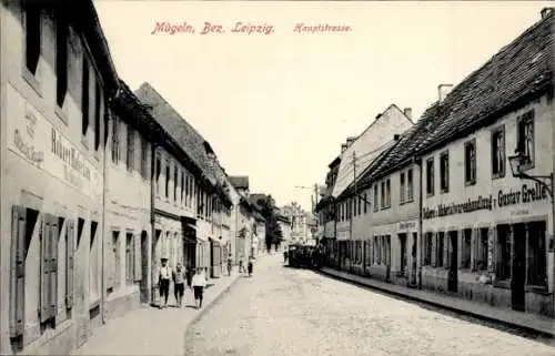 Ak Mügeln in Sachsen, Hauptstraße, Handlung von Gustav Grelle