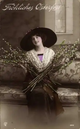 Ak Glückwunsch Ostern, Frau mit Weidenkätzchen