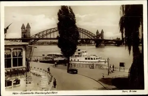 Ak Bonn in Nordrhein Westfalen, Köln Düsseldorfer Rheindampfschifffahrt, Uferpartie, Brücke