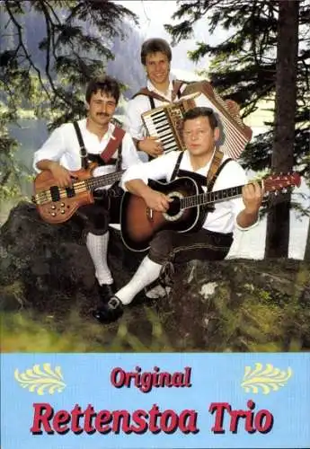 Ak Schauspieler und Sänger Original Rettenstoa Trio, mit Instrumenten im Wald, Trachten