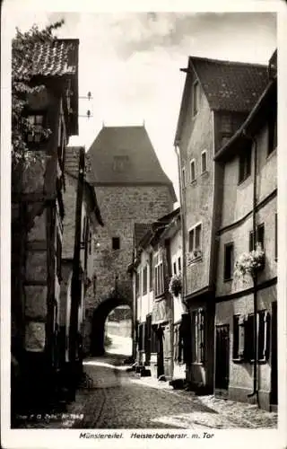 Ak Bad Münstereifel in Nordrhein Westfalen, Heisterbacher Straße mit Tor