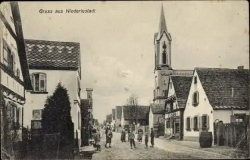 Ak Nieder Lustadt in der Pfalz, Straßenpartie, Kirche