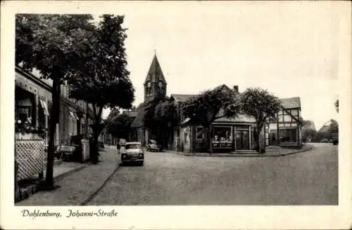 Ak Dahlenburg in der Lüneburger Heide, Johanni-Straße, Kirche, Fachwerkhaus, Auto