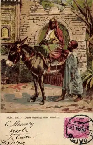 Ak Port Said Ägypten, Frau in Gewandung auf Esel sitzend