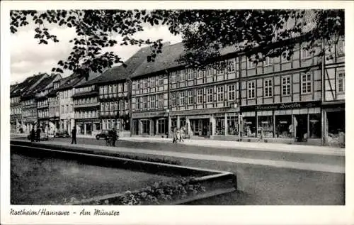 Ak Northeim in Niedersachsen, Partie am Münster, Fachwerkbauten, Geschäfte