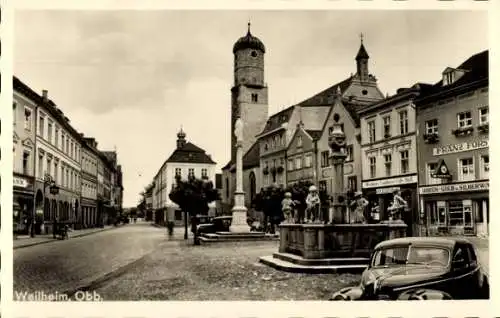 Ak Weilheim Oberbayern, Brunnen, Säule, Kirche