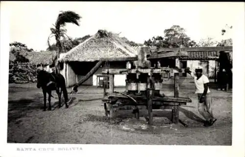 Foto Santa Cruz de la Sierra Bolivien, Ziehbrunnen, Pferd, Wohnhäuser