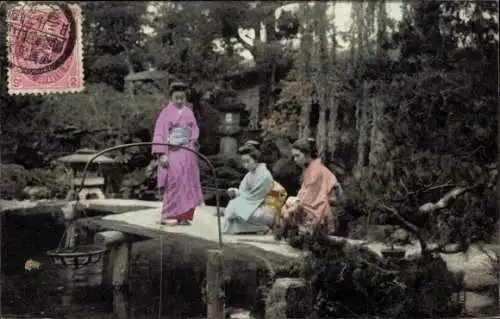 Ak Japan, Mädchen in japanischer Tracht beim Angeln, Teich, Garten