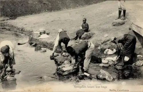 Ak Casablanca Marokko, Senegalais lavant leur linge