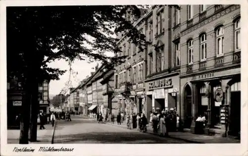 Ak Northeim in Niedersachsen, Mühlenstraße, Geschäfte, Schauburg