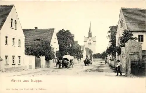 Ak Luppa Wermsdorf in Nordsachsen, Straßenpartie, Kirche