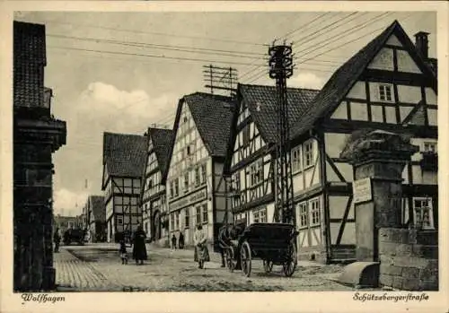 Ak Wolfhagen in Hessen, Schützebegerstraße, Fachwerkhäuser, Kutsche