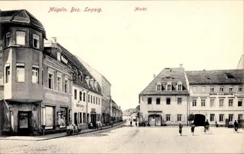 Ak Mügeln in Sachsen, Markt mit Hotel zum Hirsch, Geschäft Gustav Ludwig, Passanten