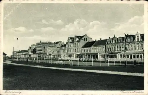 Ak Norderney in Ostfriesland, Wohngebäude und Sportplatz an der Kaiserstraße