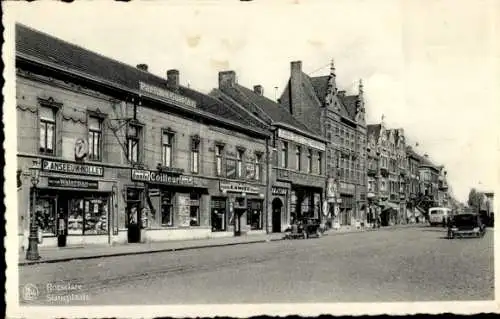 Ak Roeselare Roeselaere Rousselare Roulers Westflandern, Bahnhofsplatz, Geschäfte