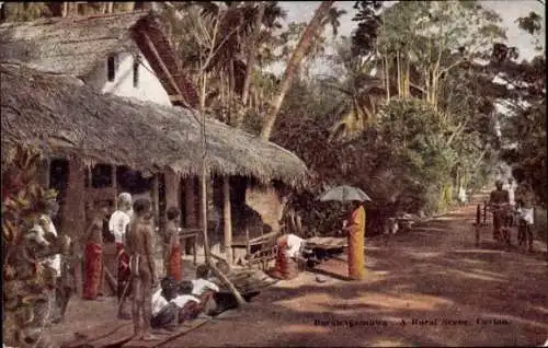 Ak Boralesgamuwa Ceylon Sri Lanka, Blick in ein Dorf, Straßenpartie, Gebäude, Passanten