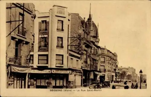 Ak Soissons Aisne, La Rue Saint Martin, Geschäfte, Autos, Häuser, Hotel