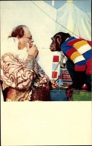 Ak Schimpanse und ein Mann rauchen Zigaretten