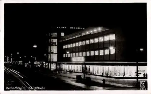 Ak Berlin Steglitz, Schloßstraße bei Nachtbeleuchtung, Wertheim Warenhaus, Langzeitbelichtung