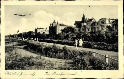 Ak Ostseebad Zinnowitz auf Usedom, Neue Strandpromenade, Flugzeug