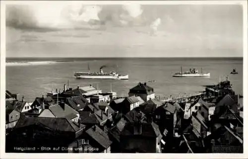 Ak Nordseeinsel Helgoland, Blick auf Düne und Brücke, Dampfer