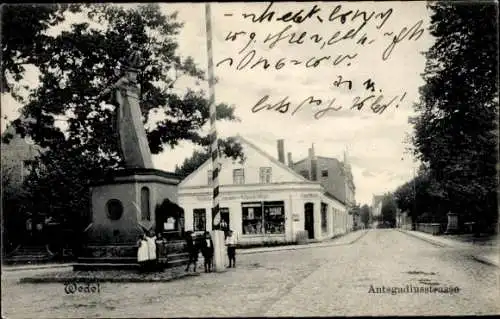 Ak Wedel an der Elbe, Ansgariusstraße, Denkmal
