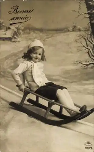 Ak Glückwunsch Neujahr, Kind auf einem Schlitten, RKL 4065 3