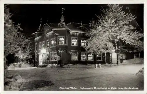 Ak Oberhof im Thüringer Wald, Hofmanns Konditorei, Nachtaufnahme, Winter