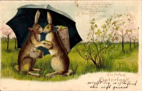 Präge Ak Glückwunsch Ostern, Küssende Hasen, Regenschirm