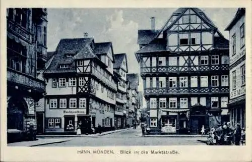 Ak Hann. Münden in Niedersachsen, Blick in die Marktstraße, Fachwerkhäuser, Buchhandlung