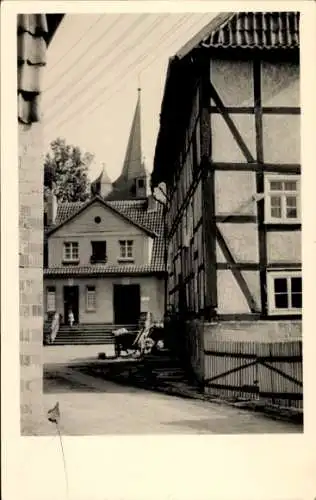 Foto Ak Kassel, Straße, Kirchturm, Fachwerkhäuser