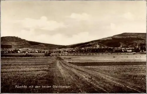 Ak Römhild, Blick über Felder zum Ort mit den beiden Gleichbergen