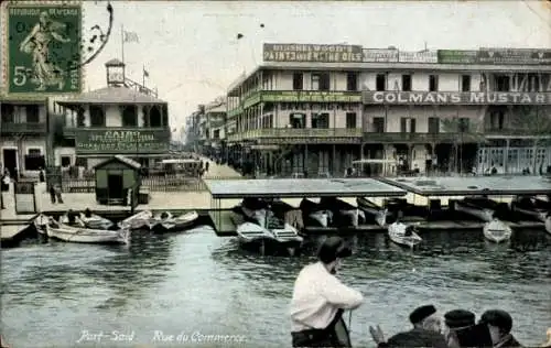 Ak Port Said Ägypten, Rue du Commerce, Ruderboote, Colmans Mustard, Geschäfte