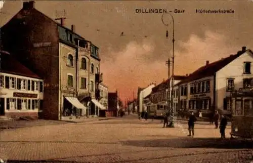 Ak Dillingen im Saarland, Hüttenwerkstraße, Straßenbahnen, Geschäfte