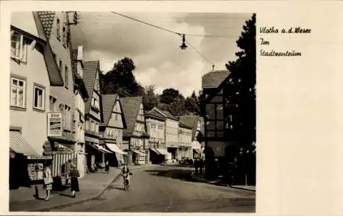 Ak Vlotho an der Weser, Stadtzentrum, Geschäfte, Fahrrad
