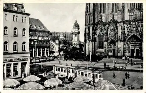 Ak Köln am Rhein, Dom, Hauptbahnhof, Straßenbahnen, Geschäfte