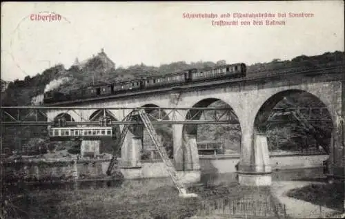Ak Elberfeld Wuppertal, Schwebebahn u. Eisenbahnbrücke bei Sonnborn, Straßenbahn