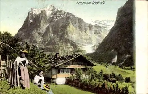 Ak Grindelwald Kanton Bern, Bernerhaus, Frauen in Tracht