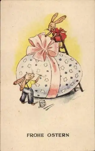 Ak Glückwunsch Ostern, Hasen bemalen ein Osterei, Schleife