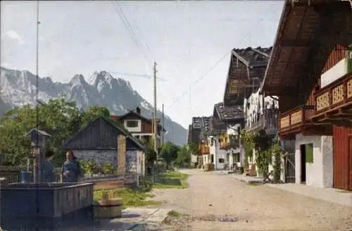 Ak Garmisch Partenkirchen in Oberbayern, Blick auf Zugspitze und Waxenstein, Wohnhäuser, Brunnen